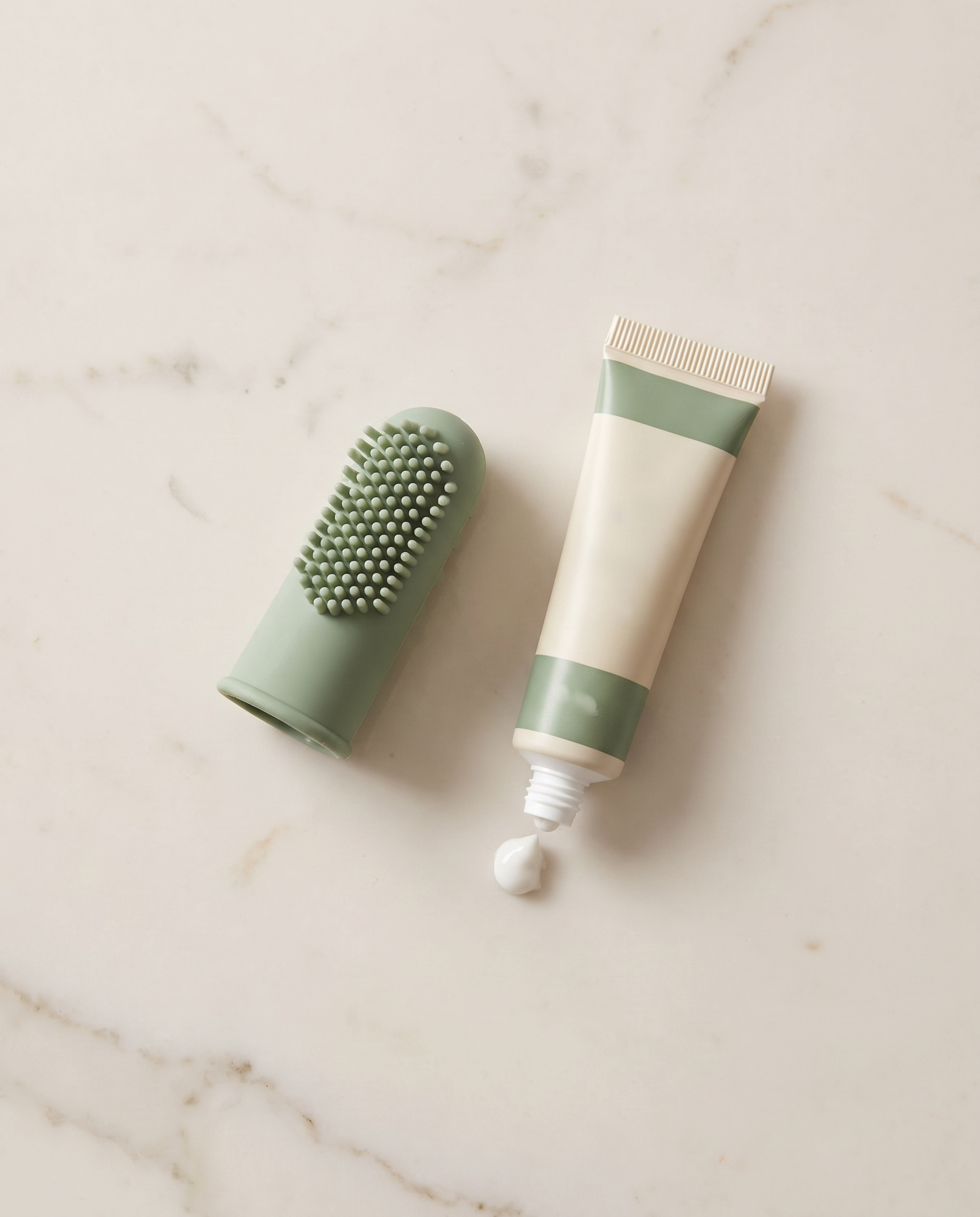 Form Finger Brush — with dog toothpaste, styled flat lay